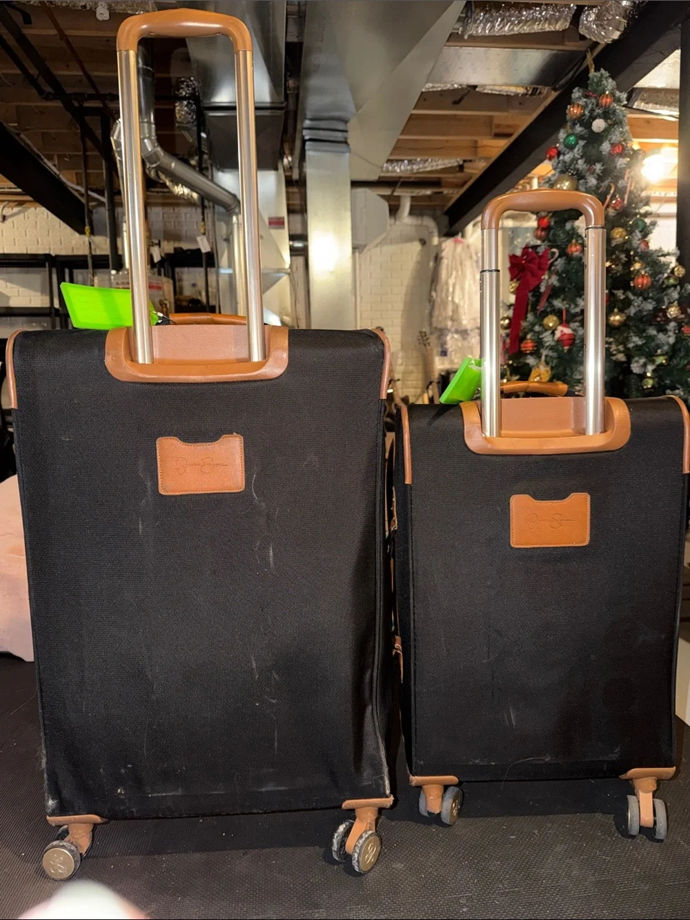 Jessica Simpson Black and Tan Rolling Luggage Set